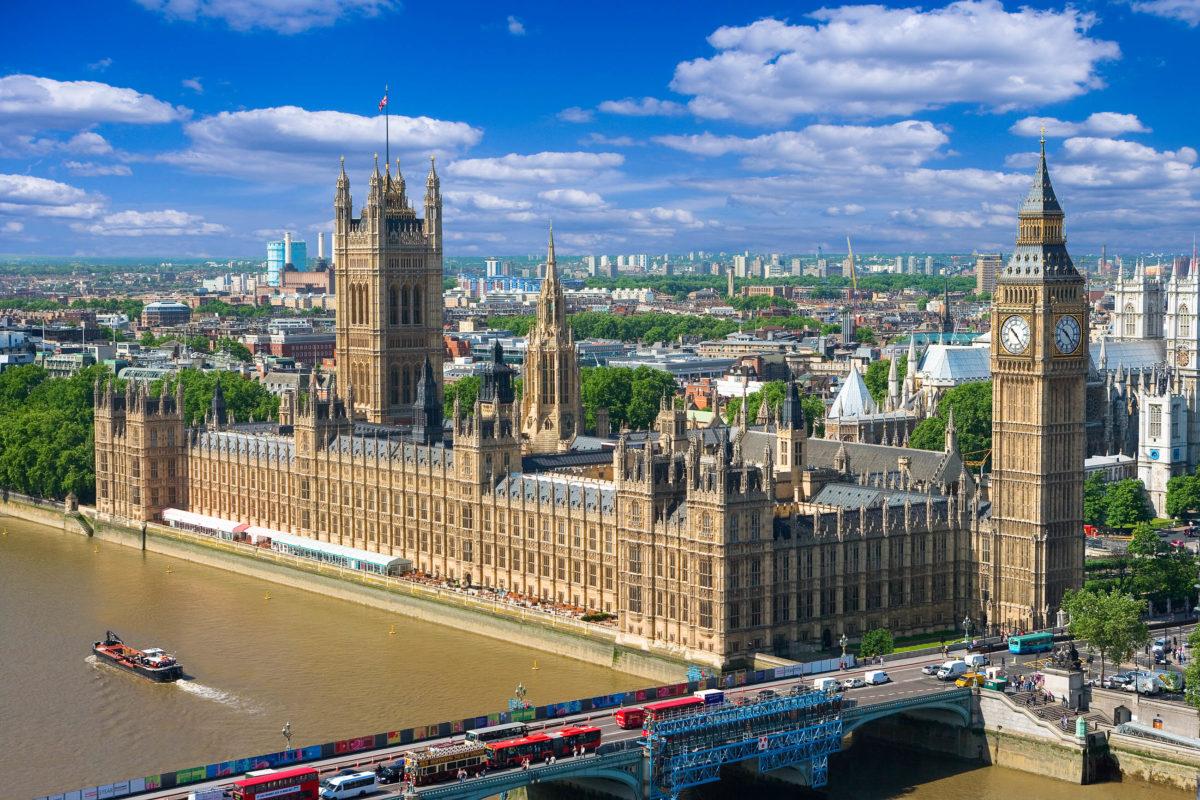 Aerial view of the Houses of Parliament in London with Victoria Tower, Big Ben and Westminster Bridge, United Kingdom - © Premier Photo / Shutterstock